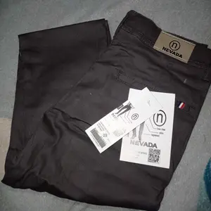 Nevada Celana Chino Pria Panjang Slimfit Brand NVD Chinos cowok Premium  Hitam Kerja Kain Stretch Tebal Formal Kantor Coklat Cream