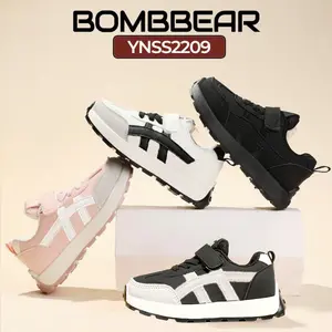 BOMBBEAR 2209 Sepatu Sekolah Anak Fashion Sneakers Bahan Strap Velcro Kulit Sintes Premium Kualitas Nyaman Lentur Ringan Desain Ergonomis untuk Aktivitas Aktif Si Kecil Warna All Black Black Putih Pink Size 26-37