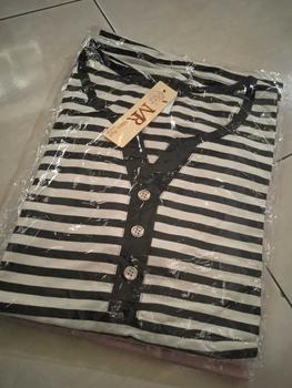 Product Review of Kaos spandek Salur V-neck import melar kancing hidup from L**a 0