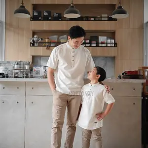 COTTONZY Koko Couple Ayah dan Anak Laki Laki Warna Putih Broken White  Usia anak 1 tahun, remaja, dewasa, dan big size. Bahan Katun Premium Model Simple untuk Acara Formal dan Casual