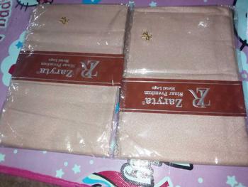 Product Review of ZARYTA SINAR LACER CUT GLAMOUR / KERUDUNG SEGIEMPAT SINAR PREMIUM METAL LOGO from u**_ 0