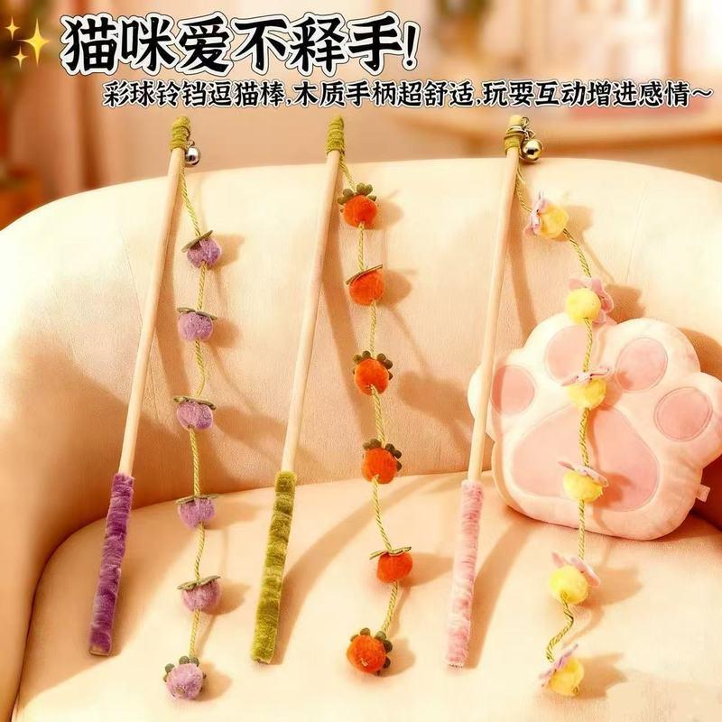 Đồ chơi cho mèo, loại nhỏ hình quả cà chua, có tay cầm dài, giúp mèo tự chơi và giải tỏa sự buồn chán, có gắn chuông, bền và chống cắn, loại đồ chơi hình quả hồng.