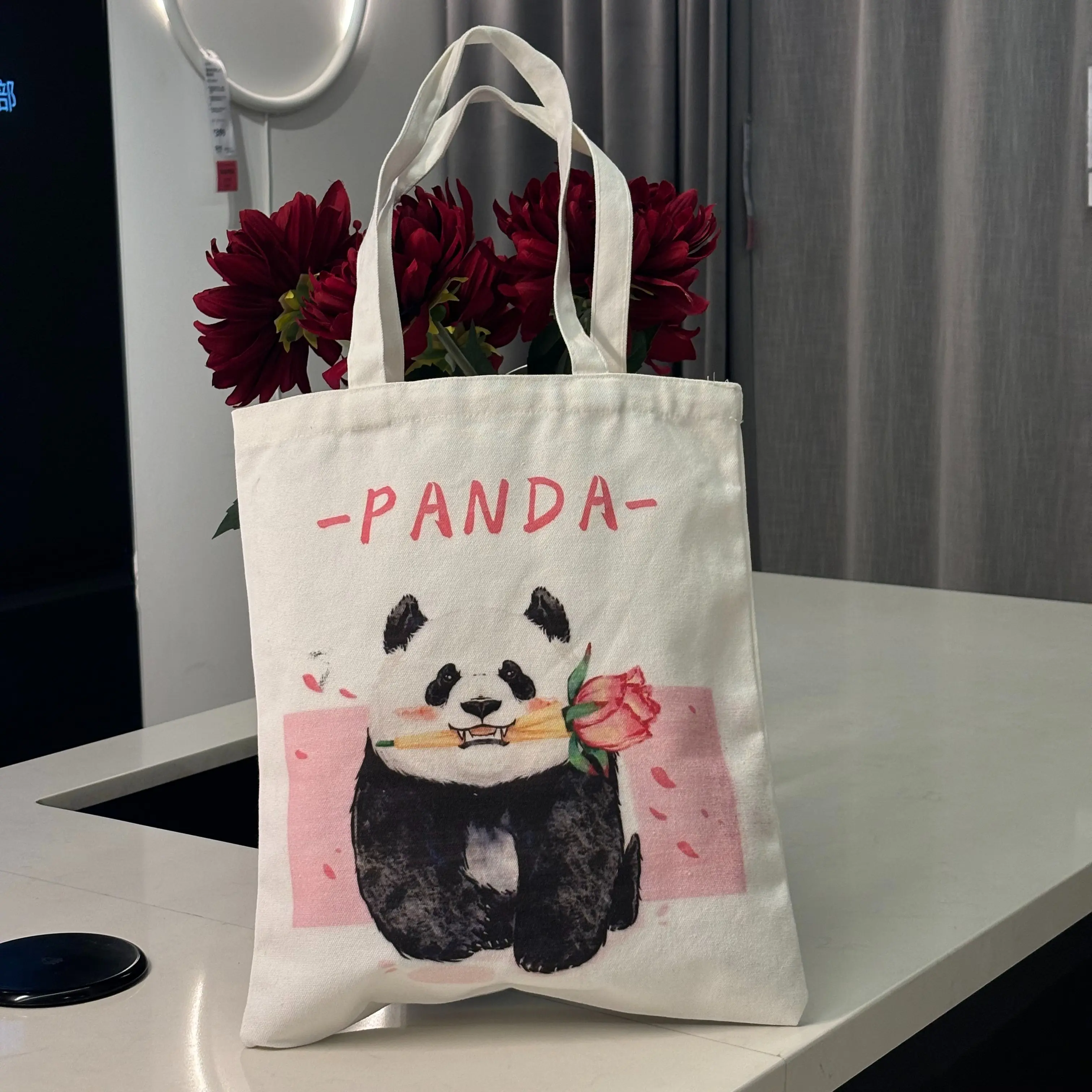 Various panda style canvas bags