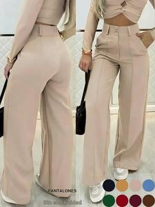 Pantalones anchos de doble botonadura sencilla, un esencial versátil para el trajín diario