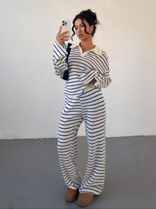 Conjunto de pantalones largos a rayas para mujer, tela elástica de punto, corte suelto, largo regular, moda otoño e invierno, cómodo para uso diario