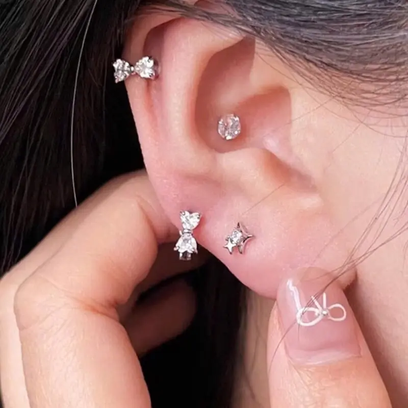 Bông tai nơ tròn bấm bạc ta Kiều Oanh J