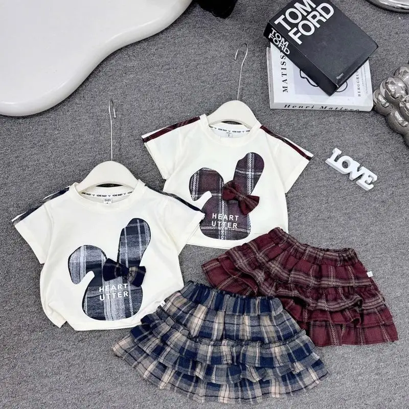 Bộ Áo + Chân Váy...( 10 -31kg ) áo hình 2 tai thỏ kẻ nâu và xanh cho be GÁI....