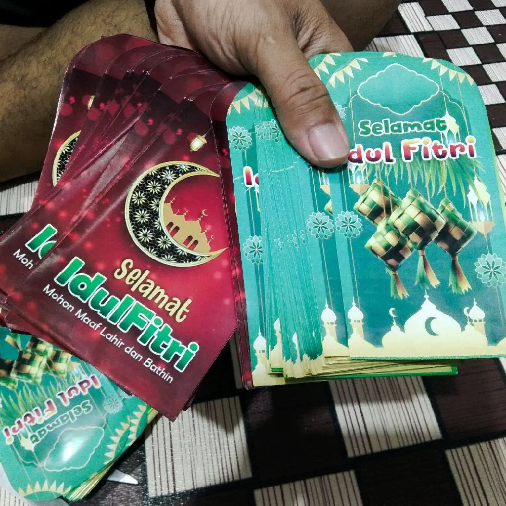 Amplop lebaran motif campur. perbungkus isi 10 lembar.