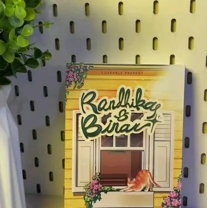 Buku Randhika & Binar - Edisi Loveably Present dengan Desain Menarik dan Ilustrasi Kucing yang Menggemaskan