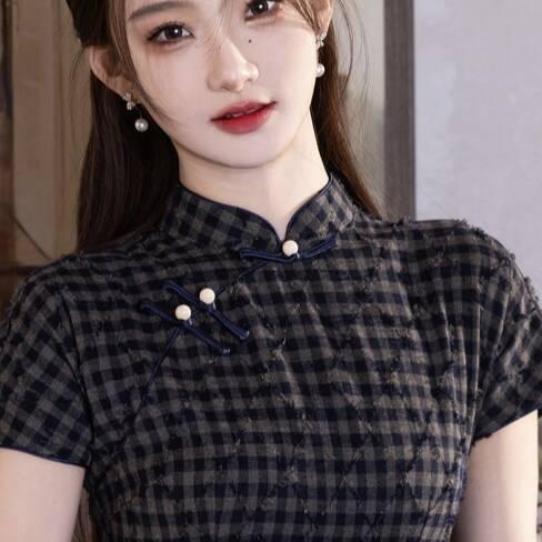Product Introduction of Haig pattern short sleeve cheongsam women's new style! The buckle design is slim and retro, which is necessary for ladies to wear elegantly, and the classic plaid shows the oriental charm. 1