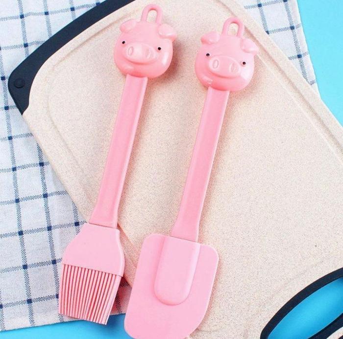 Gambar Set 2 in 1 spatula medium dan kuas silikon piglet pink dari Cherries Bakeware Jakarta Barat Tokopedia