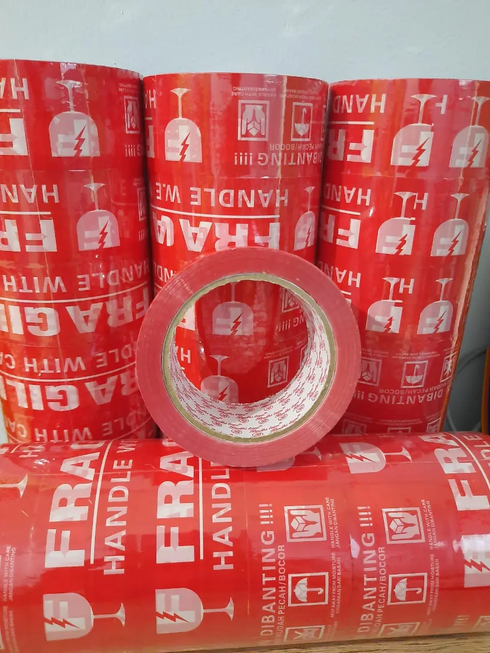 LAKBAN FRAGILE PUTIH MERAH JANGAN DI BANTING 48MM X 100 METER ORGINAL