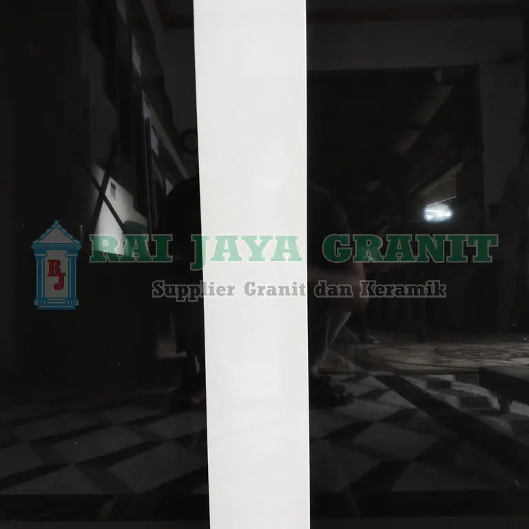 plint granit putih 10x60 0