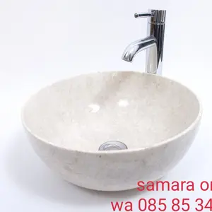 wastafel marmer bulat putih