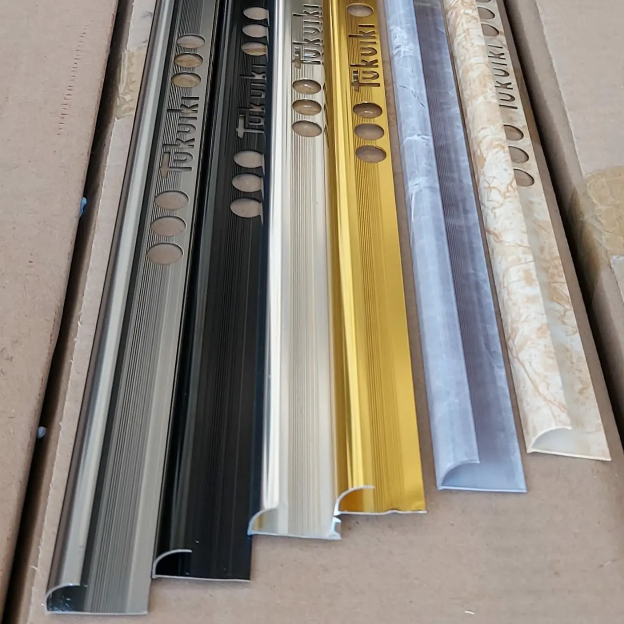 kuku macan aluminium trim