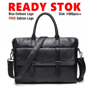 supplier tas kulit seminar instansi / souvenir perusahaan embos logo