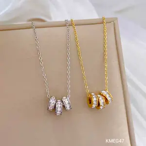 KMEG47 Kalung Titanium liontin 3/triple ring kristal putih warna silvr
