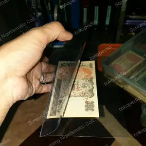 Mika Pelindung Uang Kertas