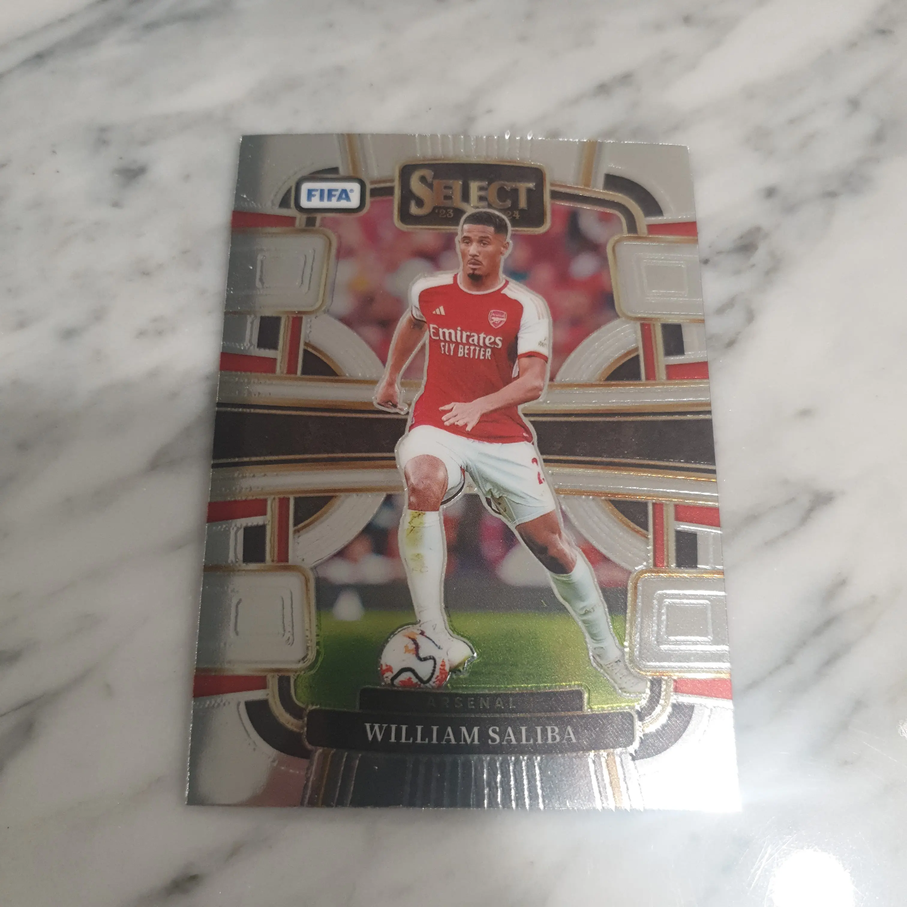 Kartu bola arsenall william saliba panini select fifa 2024