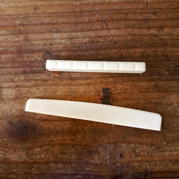 Gambar Nut Saddle Gitar Klasik - Gitar Nylon - Bahan Plastik ABS - Set nut & sadel dari debalisale Kota Denpasar Tokopedia