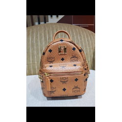 harga mcm mini backpack red, black leather Visetos Stark A reflection of MCMs ingenious design and craftsmanship MCM Stark Small Backpack Review
