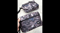 Gambar Tas tangan / hand clutch NIKE stylish dan trendy tahan air dari JPeter colection Kota Surabaya 2 Tokopedia