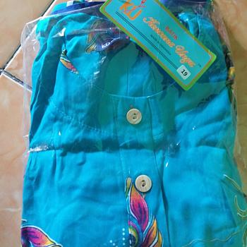 Product Review of Daster 19 pendek lengan 3/4 kencana ungu original lebel biru from Tokopedia customer review 0