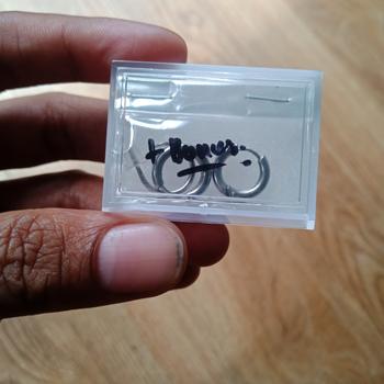 Product Review of Piercing earring anting tindik barbel jepit silver titanium. from Tokopedia customer review 1