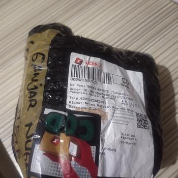 Product Review of TEZZEN POMADE ALPHA WATERBASED FREE POUCH dan Sisir Saku Tezzen from Tokopedia customer review 1