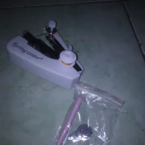Mesin Jahit Tangan Mini Stapless Baju Celana Sewing Singer Staples