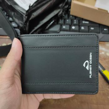 Product Review of Dompet Lipat Pria Planet Ocean Hitam Original - PO02 from Tokopedia customer review 0