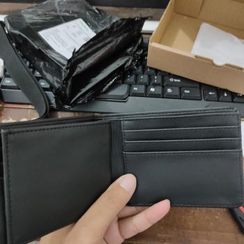 Product Review of Dompet Lipat Pria Planet Ocean Hitam Original - PO02 from Tokopedia customer review 1