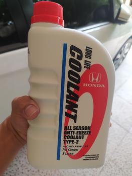Product Review of Air Cairan Pendingin BIRU HONDA Radiator Coolant TYPE 2 Biru Genuine original baru 1 botol 1 liter Made In Thailand car from Tokopedia customer review 2