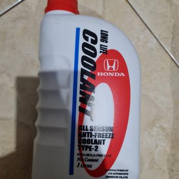 Product Review of Air Cairan Pendingin BIRU HONDA Radiator Coolant TYPE 2 Biru Genuine original baru 1 botol 1 liter Made In Thailand car from Tokopedia customer review 0