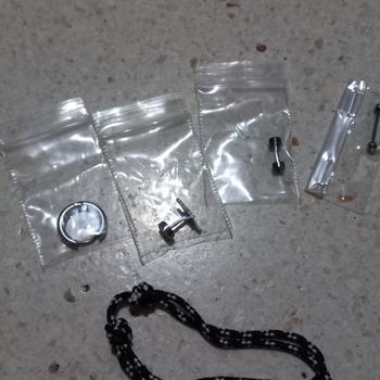 Product Review of Piercing earring anting tindik barbel jepit silver titanium. from Tokopedia customer review 0
