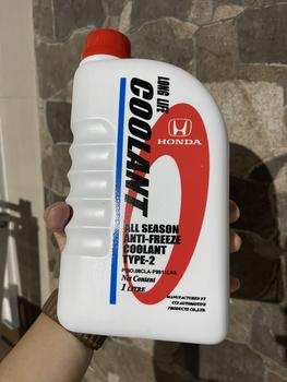 Product Review of Air Cairan Pendingin BIRU HONDA Radiator Coolant TYPE 2 Biru Genuine original baru 1 botol 1 liter Made In Thailand car from Tokopedia customer review 1