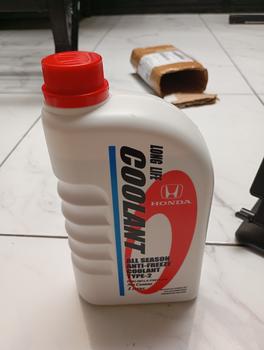 Product Review of Air Cairan Pendingin BIRU HONDA Radiator Coolant TYPE 2 Biru Genuine original baru 1 botol 1 liter Made In Thailand car from Tokopedia customer review 2