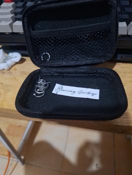 Product Review of Piercing earring anting tindik barbel jepit silver titanium. from Tokopedia customer review 0