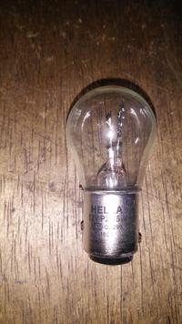 Gambar Lampu Bohlam Besar Rem Stop 12v kaki 2 Hella P21/5W dari JayaRayaParts Kab. Tangerang 3 Tokopedia