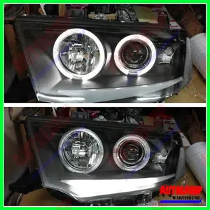 HEADLAMP MITSUBISHI PAJERO SPORT 2009 - 2015 BLACK HOUSING