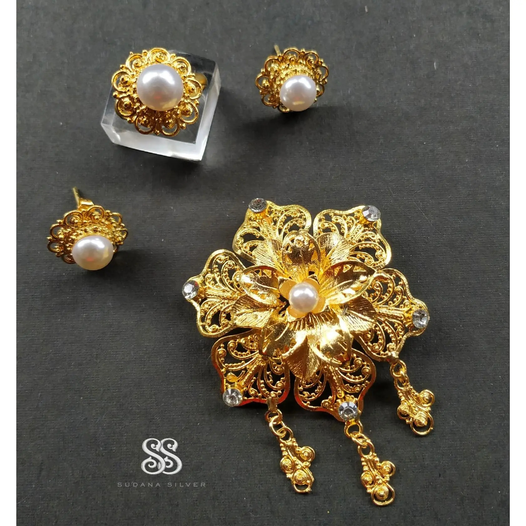 Set Bros Alpaka Mutiara Bunga Sirkon Gold Sup Bali