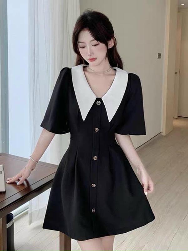 váy hàng  cúc dọc to